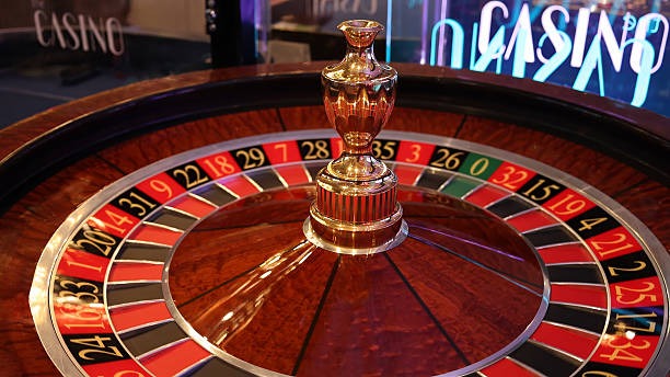Fa Cai Shen Deluxe game interface showing fortune symbols and payline grid